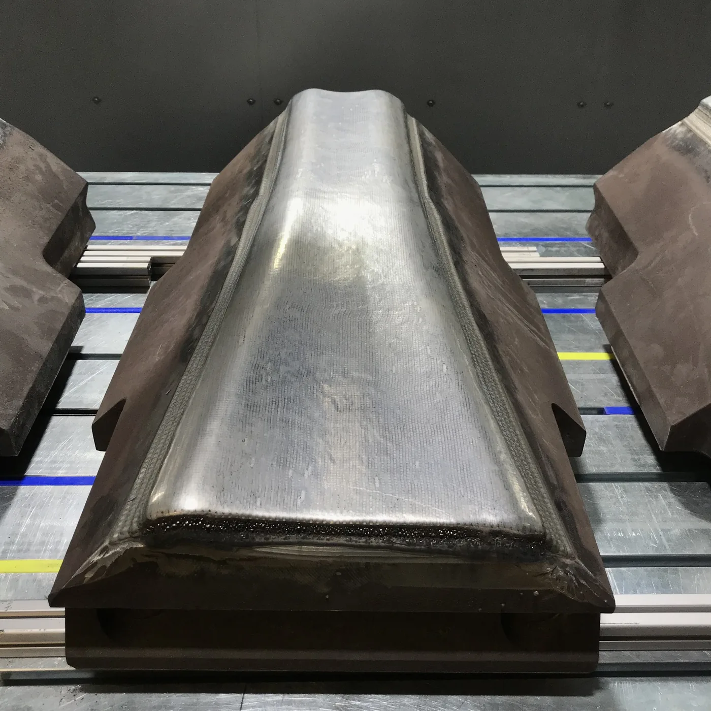 Forging hammer after finishing with the repaired working surface visible