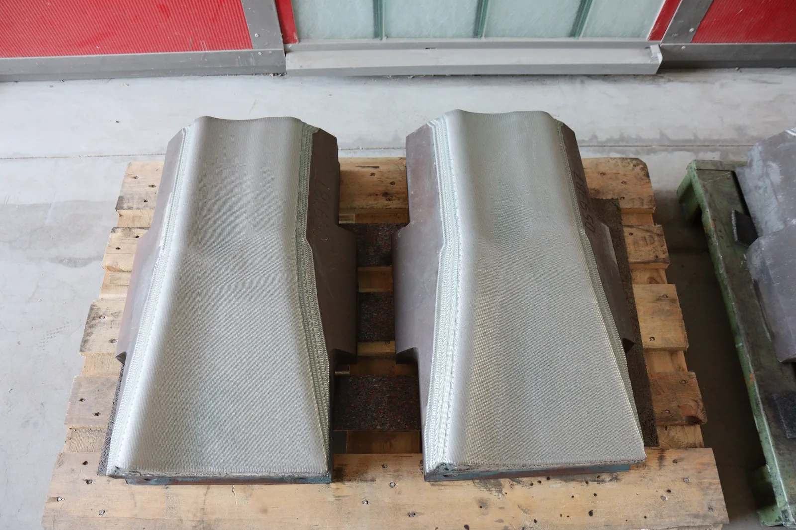 Top view of finished forging hammers after LMD reinforcement and finishing