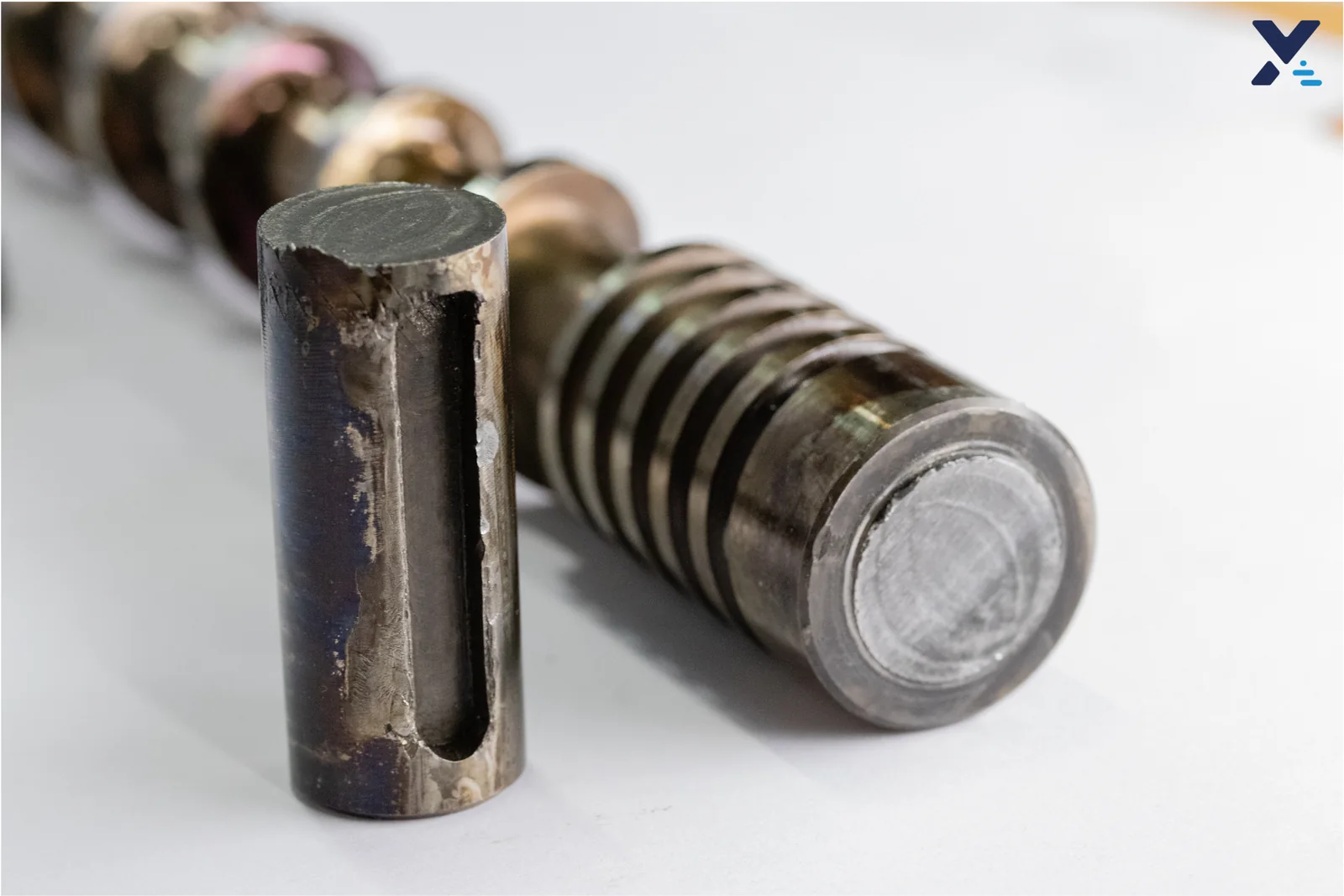 Damaged screw shaft section cut away before LMD repair