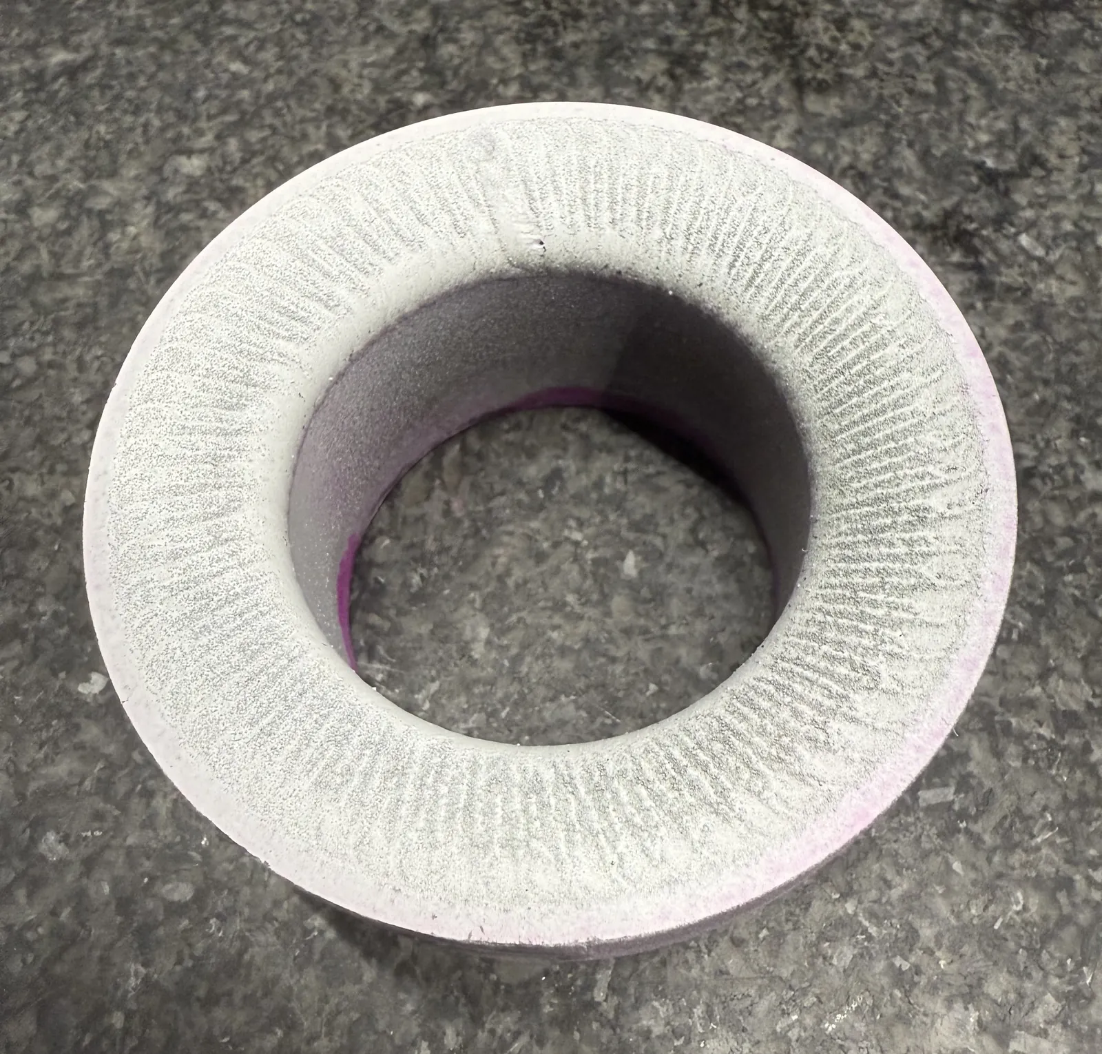 Valve seat ring after dye test with no visible cracks or pores in the photographed condition