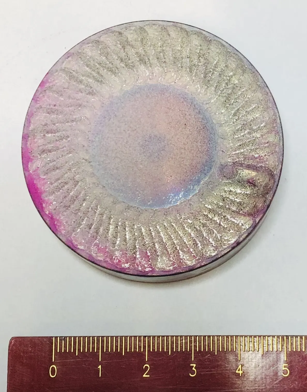 Wear ring after dye test showing crack-controlled coating result